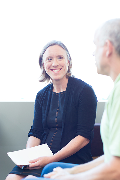 OHSU Social Worker Caroline Macuiba consulting with a patient